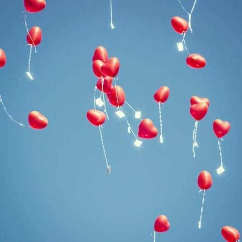 Releasing Red Heart Balloons -letting go