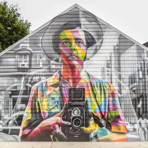 An image of a photographer in color merged onto a background of a barn in black and white, illustrating the depth of his inner artist.