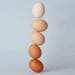 5 eggs balancing in a tower