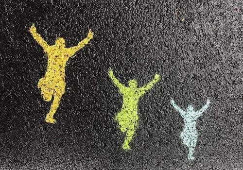 chalk figures on a sidewalk