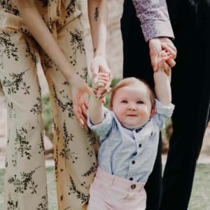 small child learning to walk