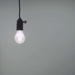 bare light bulb hanging from ceiling