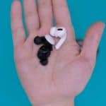 ear buds in an open hand