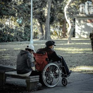man in wheelchair learning to sit