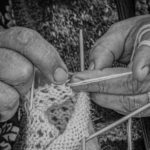 Old woman's hands knitting