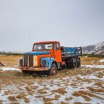 benefit of aging shown in an old multicolored truck