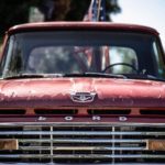 hood of an old ford truck with 