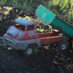 an old rusty toy truck used to describe the benefits of aging