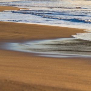 tide coming in on beach