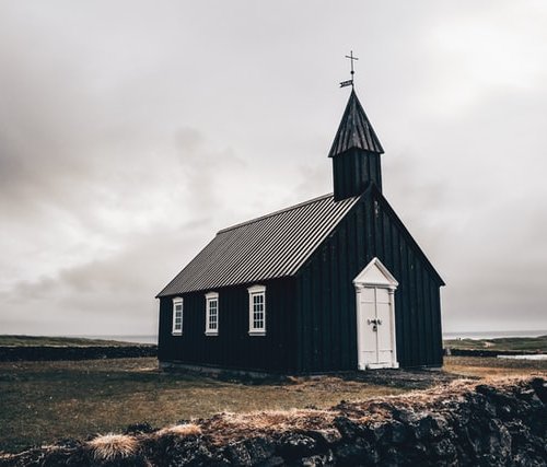 old church with closed doors