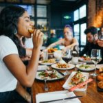 people in a restaurant eating