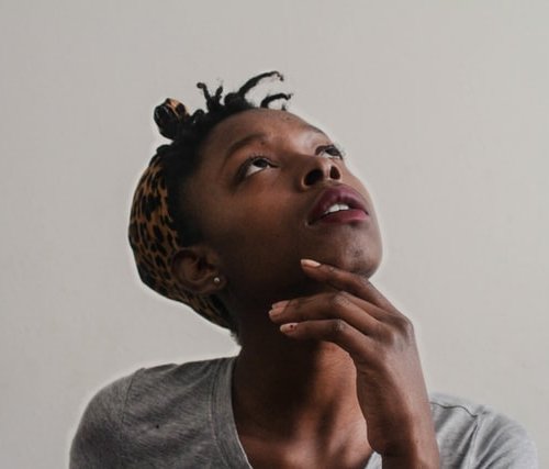 Woman with questioning face wonders about sound of silence