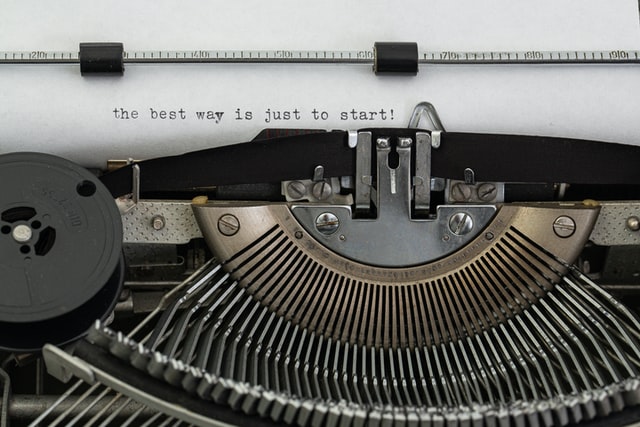 a typewriter showing the words "the best way is just to start' as guidance on how to write ardis mayo